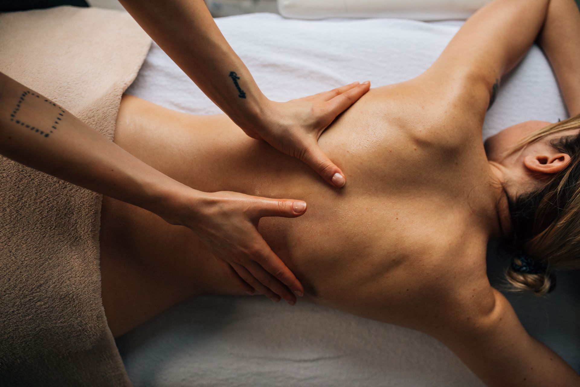 A relaxing massage therapy session with a focus on wellness and self-care indoors.